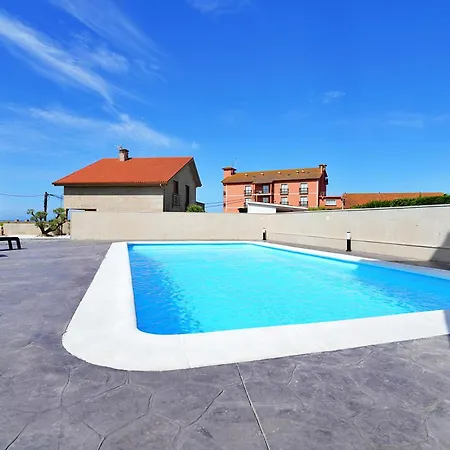 Con Piscina Frente A La Playa De Paxarinas アパート