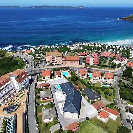 Con Piscina Frente A La Playa De Paxarinas アパート サンシェンショ