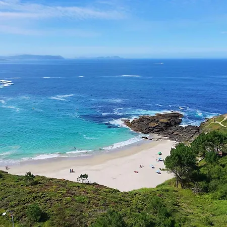 Con Piscina Frente A La Playa De Paxarinas アパート サンシェンショ